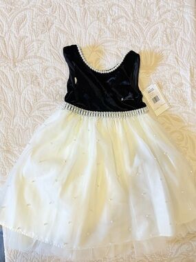 Elegant Black and White Pearl-Trim Girls' Dress with Bow
